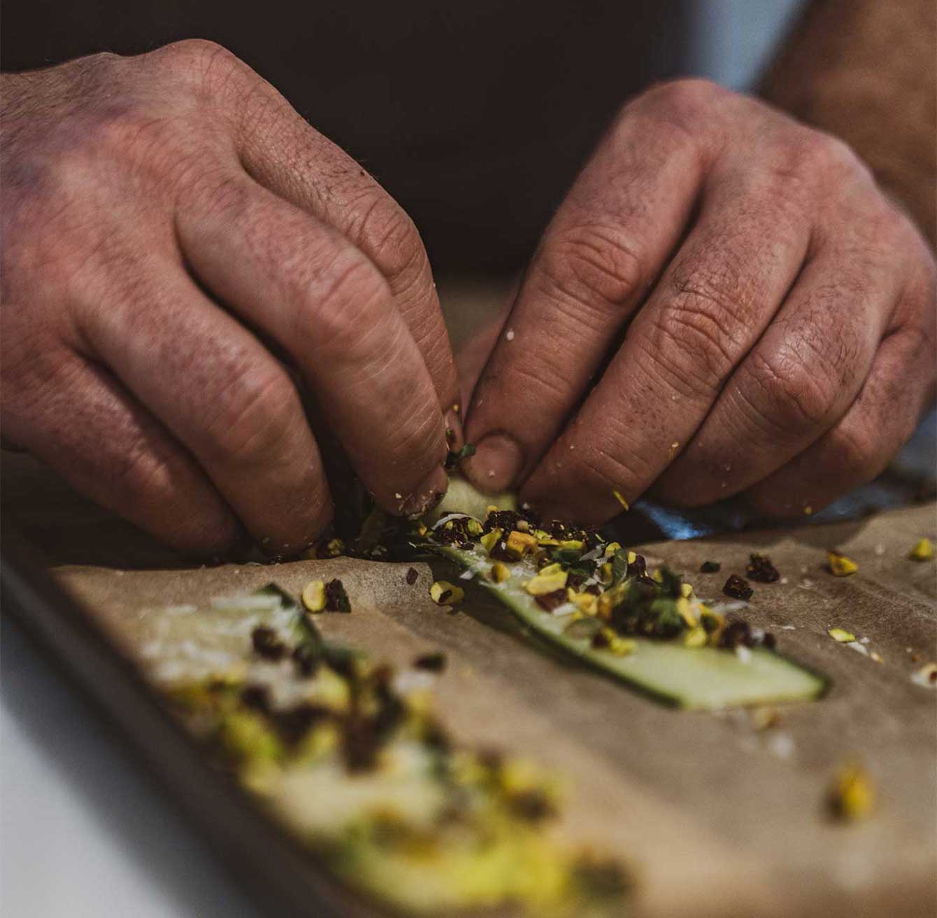 Chef Pieter rolling veggies